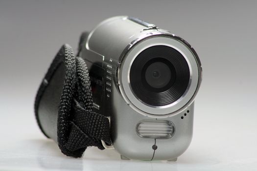 Small silver digital Camera with flashlight