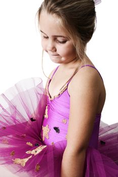 Young girl wearing a tutu dreaming of becoming a ballet dancer 