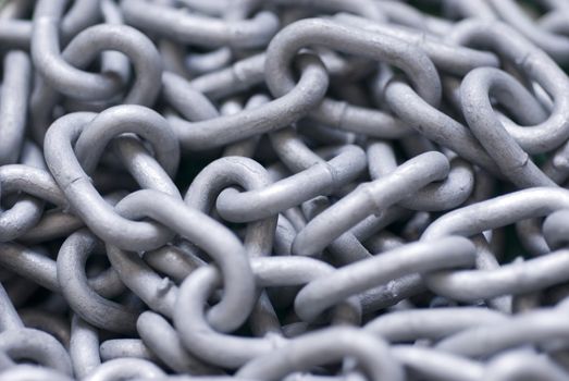 a tangled backdrop of metal chain links