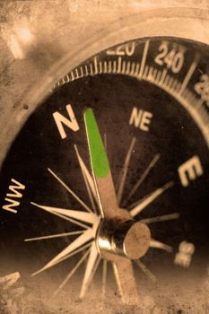 Retro look of compass showing the way to north