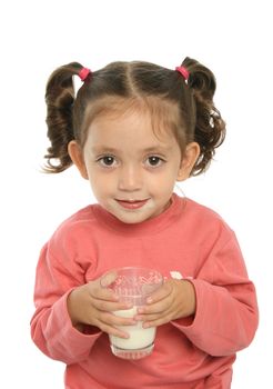 Toddler enjoying a glass of fresh milk