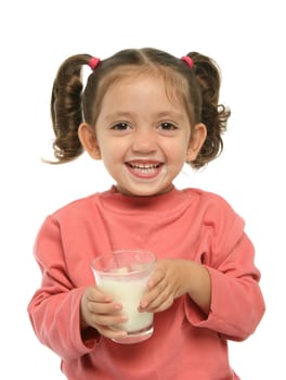 Toddler enjoying a glass of fresh milk