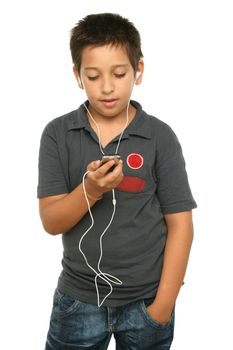 Boy listening music with a mp4 player, white background