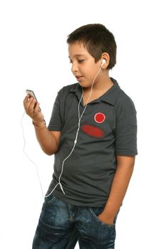 Boy listening music with a mp4 player, white background