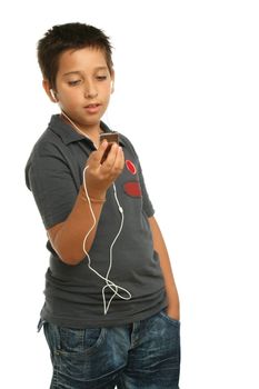 Boy listening music with a mp4 player, white background