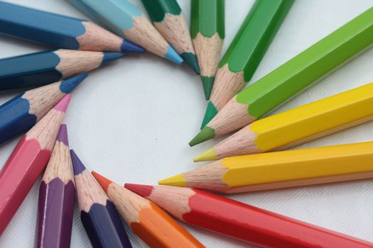 Brand new, unused color pencils in a circle