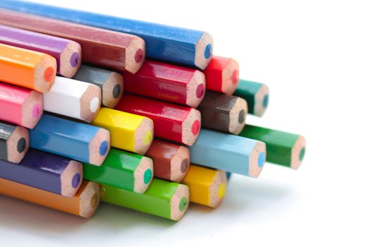 Stack of color pencils showing their buds