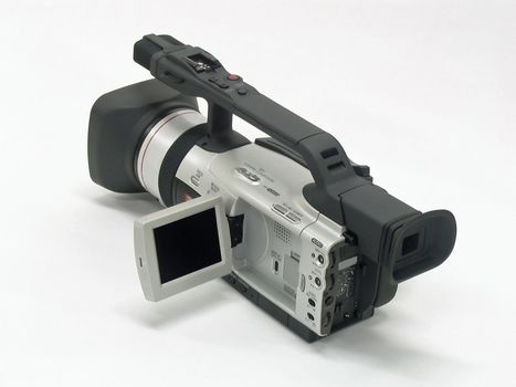 This is a picture of a modern video camera isolated on a white background.