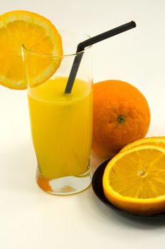 
	
The traditional orange juice and cut an orange in the plates