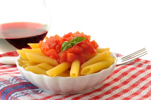 Fresh penne pasta with tomato and basil sauce.