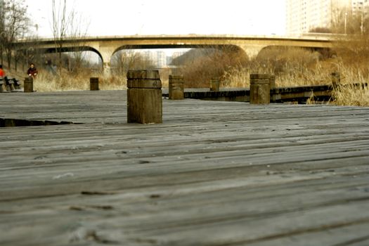 Wooden Plank Walkway in a park near the river Dogok of Korea