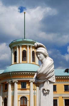 Classical statue and old building in Arkhangelskoye, Moscow, Russia