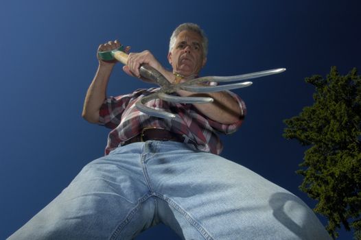 What a worm sees as a gardener drives his fork into the soil.