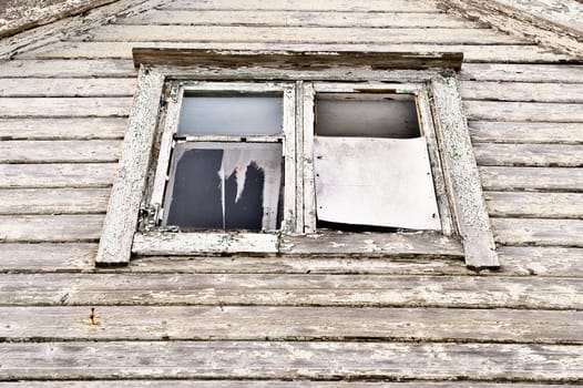 Scary dark window in old haunted house