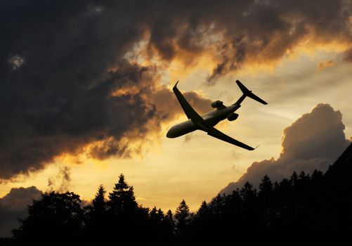 minatory clouds of a thunderstorm with landing plane