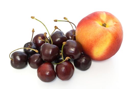 nectarine and cherries isolated on white background