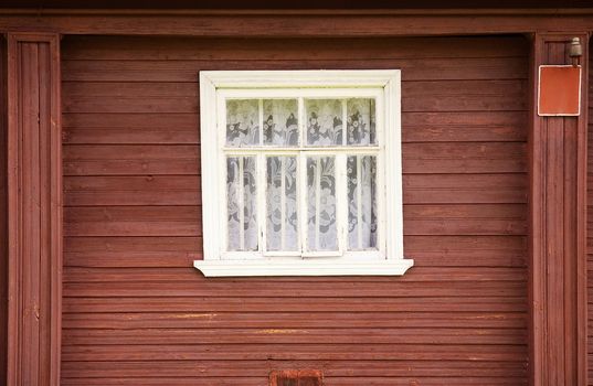 The one  window of old wooden rural house