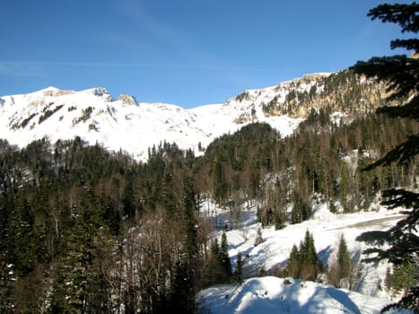 The main Caucasian ridge; rocks; a relief; a landscape; a hill; a panorama