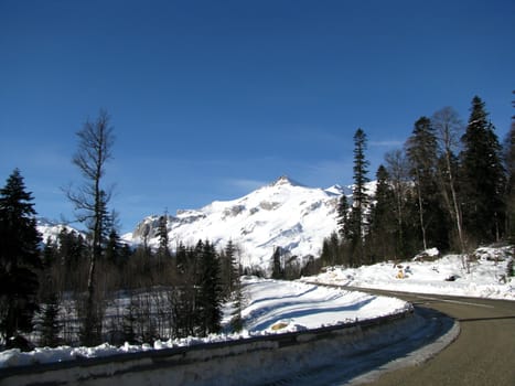 The main Caucasian ridge; rocks; a relief; a landscape; a hill; a panorama
