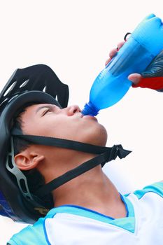 thirsty cyclist drinking a cold water