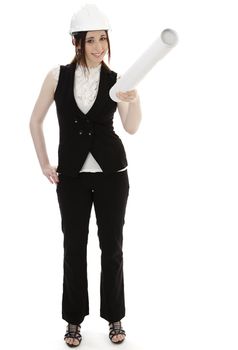 Young business woman wearing a business suit and construction had holding a white tube and pointing up against a white background 