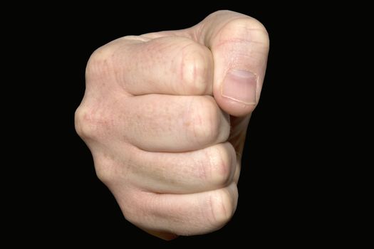 Close up of a clenched fist on a black background