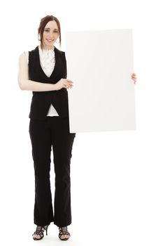 Young business woman wearing a business suit with a happy expression holding a white board against white background