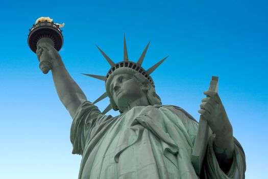 Statue of liberty with a blue sky background