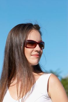 Portrait of the girl in sunglasses