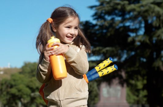 The little sportswoman in park