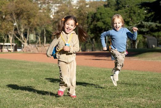 Children running in park