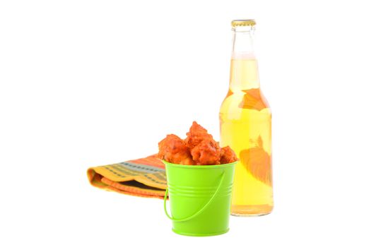 Bucket of spicy barbecue wings and cold beer.