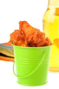 Bucket of hot and spicy chicken wings.