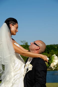 Bride and groom looking at each other