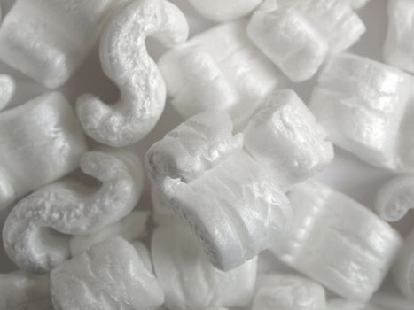 Expanded polystyrene beads for packaging useful as a background