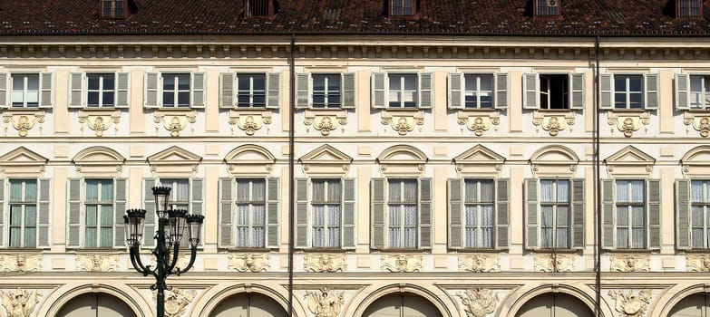 Typical traditional baroque facade of Turin (Piazza San Carlo)