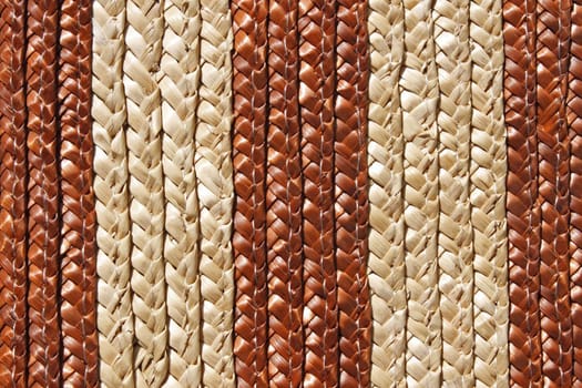 Detail of colorful painted woven straw products