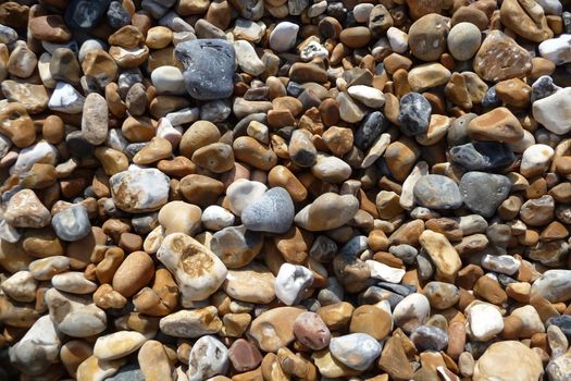 Close up of stones on Brighton Beach.