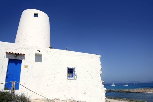 Balearic islands architecture white mill in Formentera over blue sky