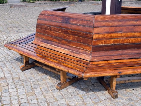 Classical design beautiful wooden bench in a park