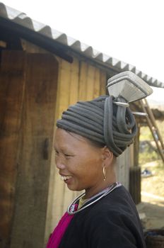 The Dao black ethnicity are widespread in northern Vietnam. But Dao Tien are unique because the women wear a shirt and black trousers, but above this cap so special. The cap is made of braided rope black head cap and It is surmounted by an inverted truncated pyramid hammered aluminum.