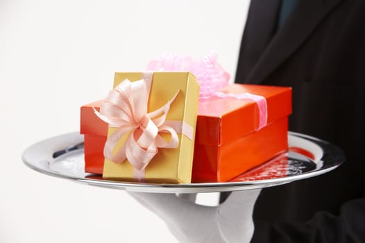 man holding exclusive presents to someone special