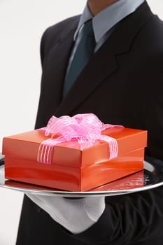 man holding exclusive presents to someone special