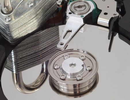 A strong lock reflected in a harddrive.