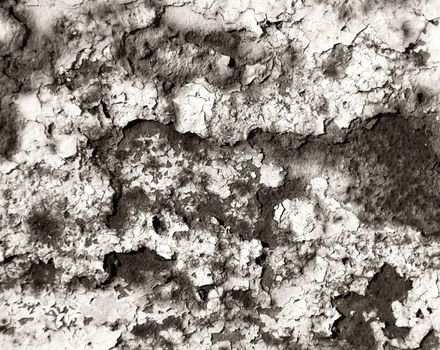 Painted wall with cracks monochrome background