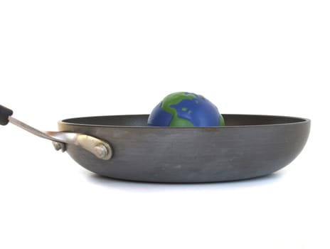  Earth sits in a Frying pan to represent Global Warming.