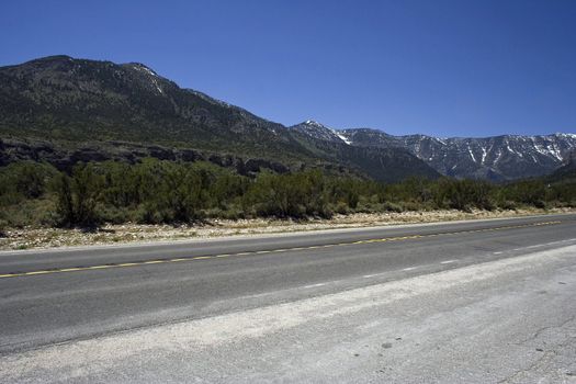 Freeway with nobody with the rocks on horizon