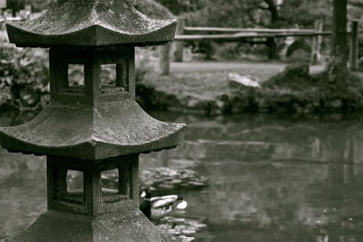 Vintage photo of stoned sculpture in a japanese garden