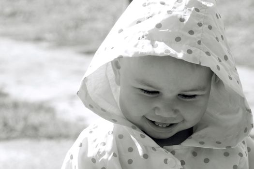 pretty smiling child in monochrome