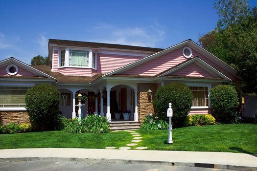 Modern american two-floored cottage with garden